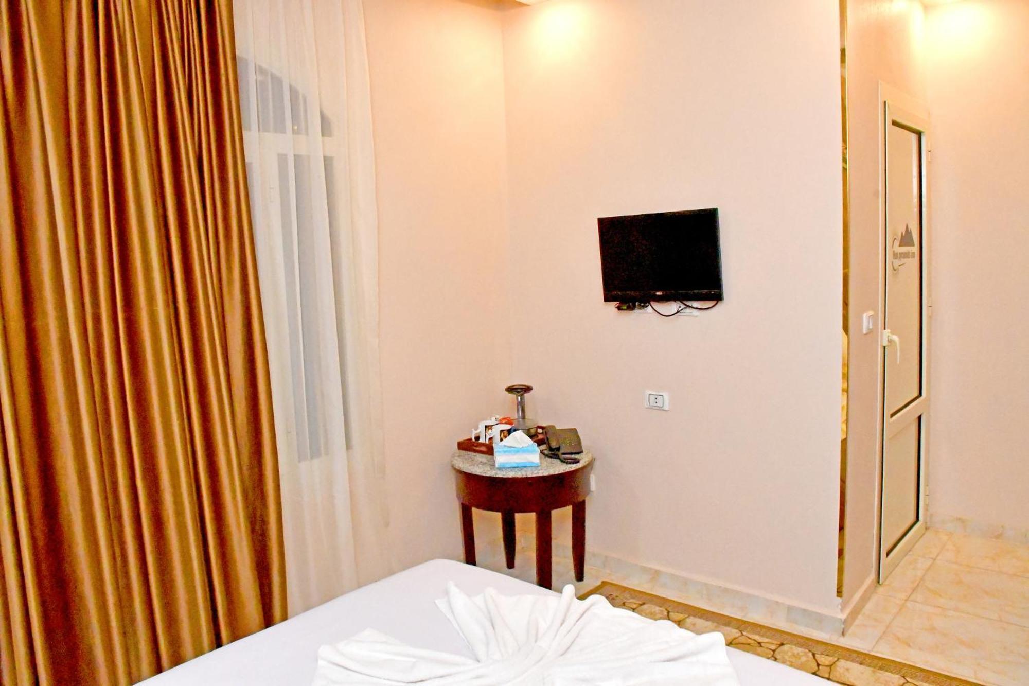 Nun Pyramids Hotel Kafrat al Jabal Ruang foto